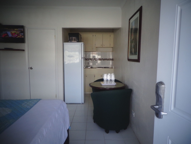 Imagen de la habitación del Hotel The Colony Club Inn and Suites. Foto 7