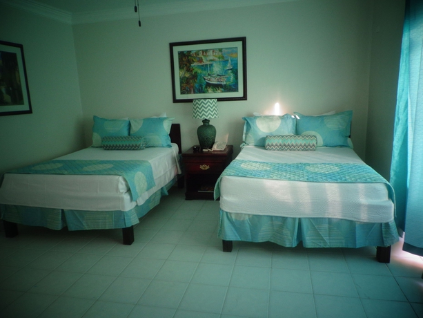 Imagen de la habitación del Hotel The Colony Club Inn and Suites. Foto 10