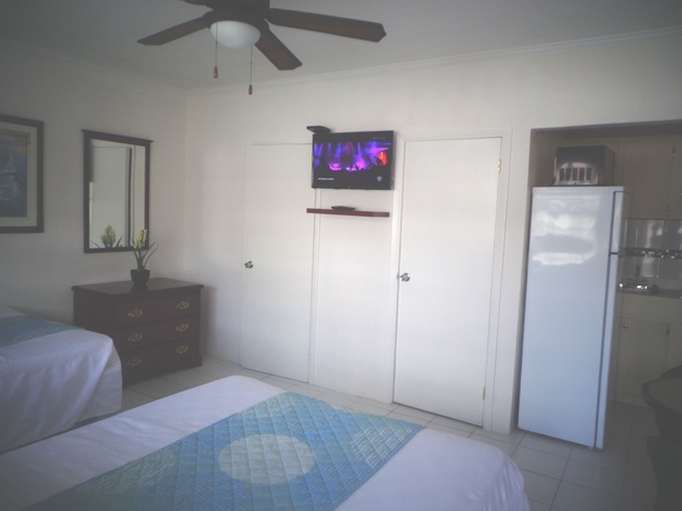 Imagen de la habitación del Hotel The Colony Club Inn and Suites. Foto 11