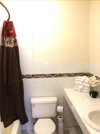 Imagen de la habitación del Hotel The Colony Club Inn and Suites. Foto 17