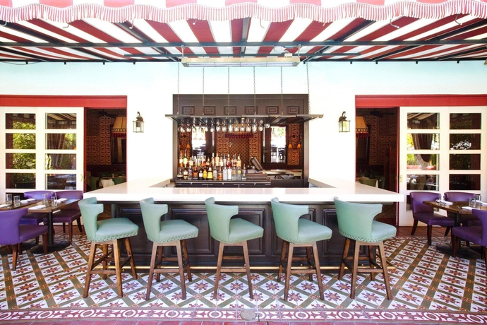 Imagen del bar/restaurante del Hotel The Colony Palms and Bungalows - Adults Only. Foto 2