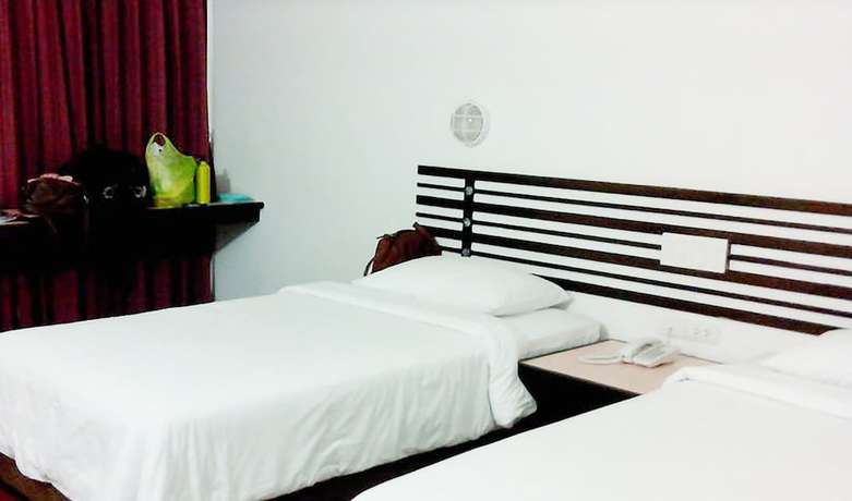Imagen de la habitación del Hotel The Color Hat Yai. Foto 10