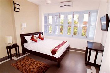 Imagen de la habitación del Hotel The Columns. Foto 2