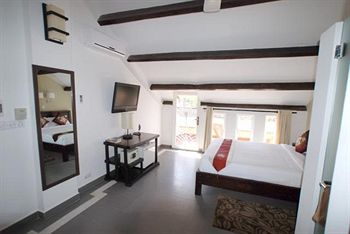 Imagen de la habitación del Hotel The Columns. Foto 14