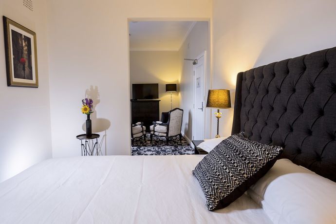 Imagen de la habitación del Hotel The Commercial Boutique. Foto 5