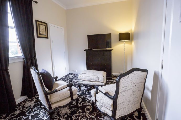 Imagen de la habitación del Hotel The Commercial Boutique. Foto 6