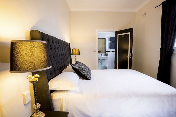 Imagen de la habitación del Hotel The Commercial Boutique. Foto 13