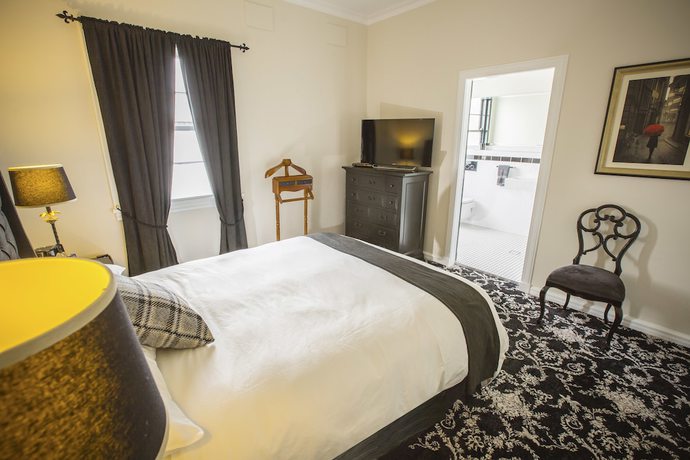 Imagen de la habitación del Hotel The Commercial Boutique. Foto 16