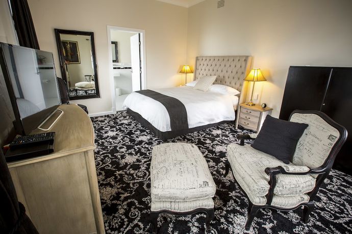 Imagen de la habitación del Hotel The Commercial Boutique. Foto 17