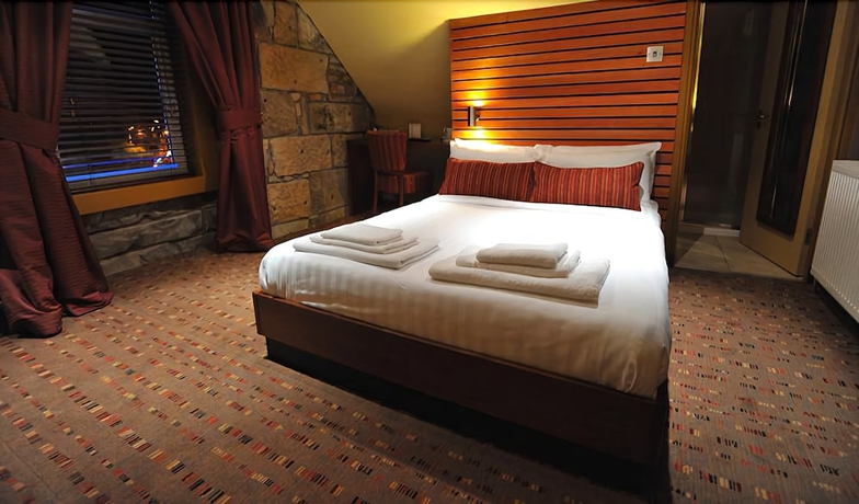 Imagen de la habitación del Hotel The Commercial. Foto 3