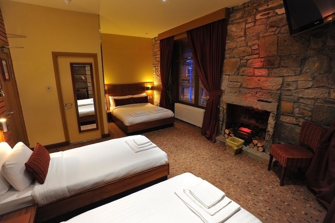 Imagen de la habitación del Hotel The Commercial. Foto 5