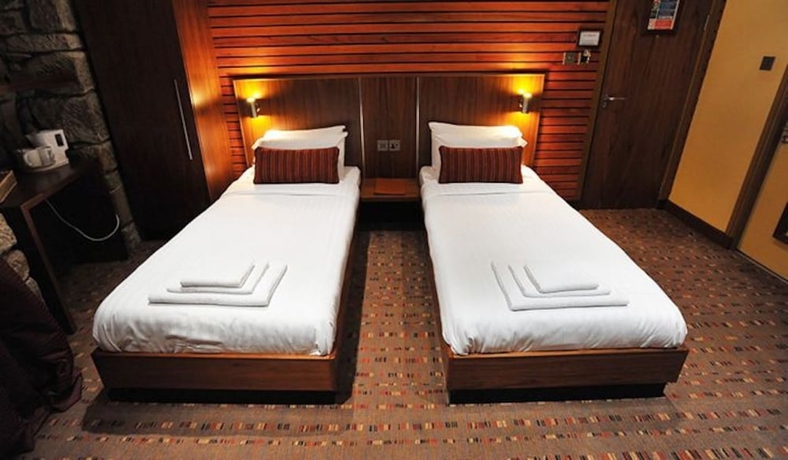 Imagen de la habitación del Hotel The Commercial. Foto 7