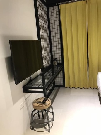 Imagen de la habitación del Hotel The Compass Inn. Foto 15