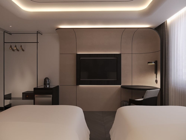 Imagen de la habitación del Hotel The Concept HCMC - City Center. Foto 11