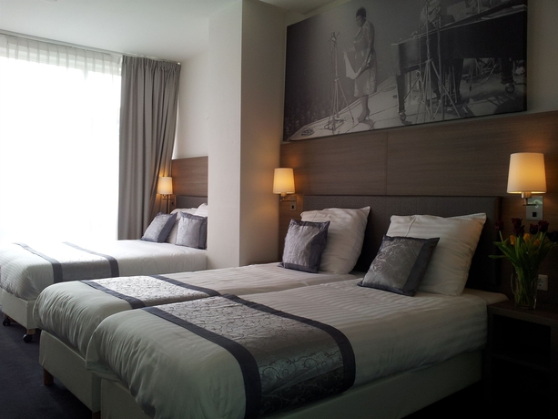 Imagen de la habitación del Hotel The Concert. Foto 12