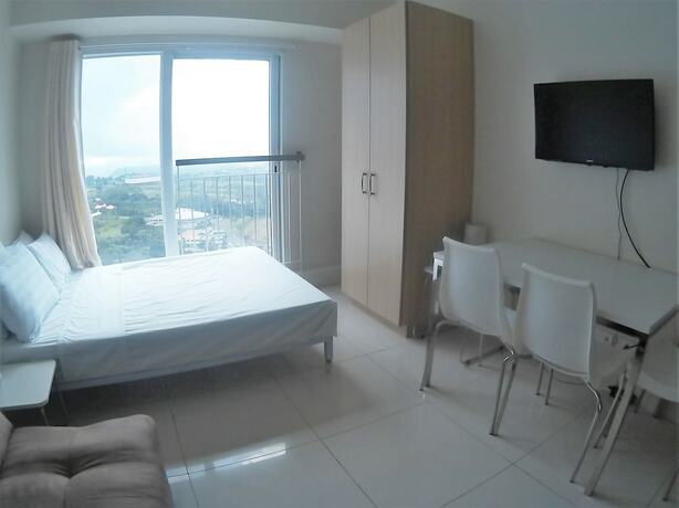 Imagen de la habitación del Hotel The Concierge at Wind Residences Tagaytay. Foto 19