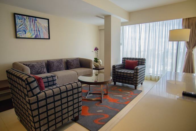 Imagen de la habitación del Hotel The Concord And Suites. Foto 6