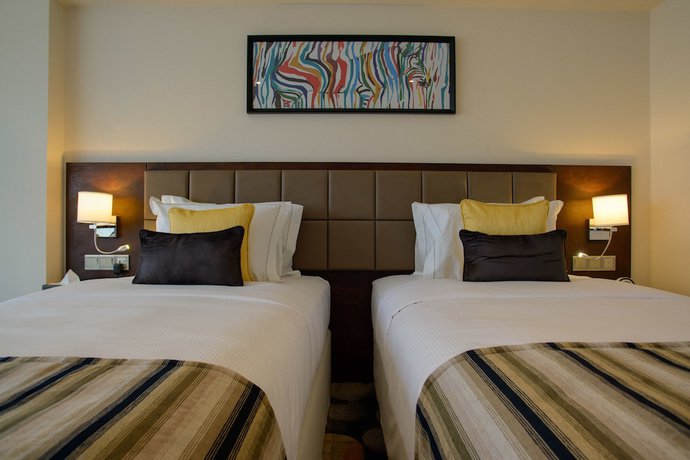 Imagen de la habitación del Hotel The Concord And Suites. Foto 9