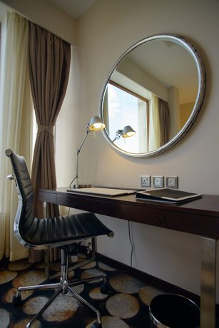 Imagen de la habitación del Hotel The Concord And Suites. Foto 13