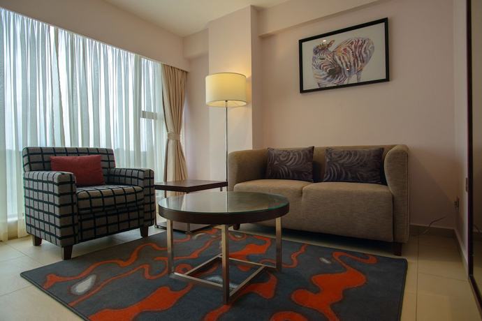 Imagen de la habitación del Hotel The Concord And Suites. Foto 14