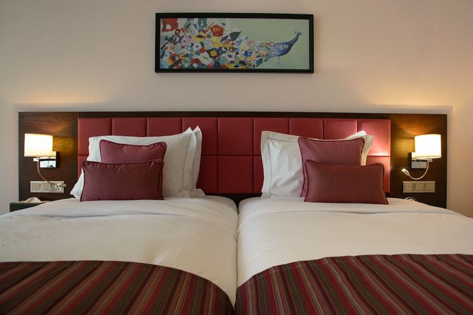 Imagen de la habitación del Hotel The Concord And Suites. Foto 16