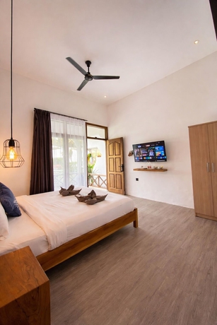 Imagen de la habitación del Hotel The Confidential Mandalika. Foto 4