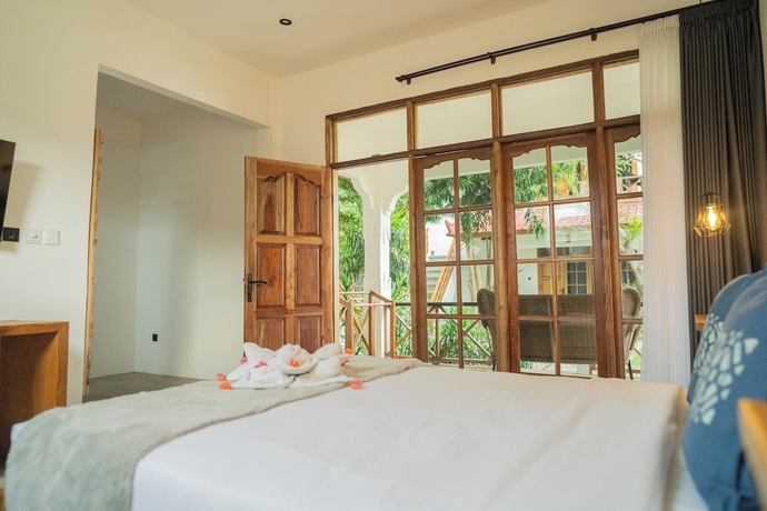 Imagen de la habitación del Hotel The Confidential Mandalika. Foto 9
