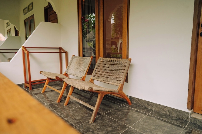 Imagen de la habitación del Hotel The Confidential Mandalika. Foto 10