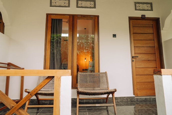 Imagen de la habitación del Hotel The Confidential Mandalika. Foto 11
