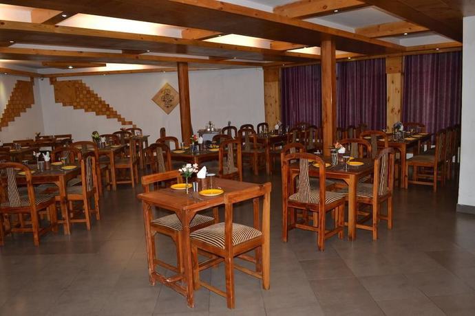 Imagen del bar/restaurante del Hotel The Conifer. Foto 6