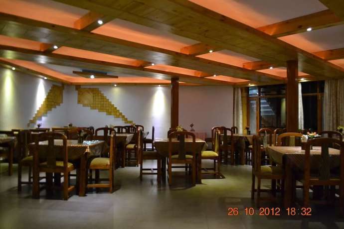 Imagen del bar/restaurante del Hotel The Conifer. Foto 7
