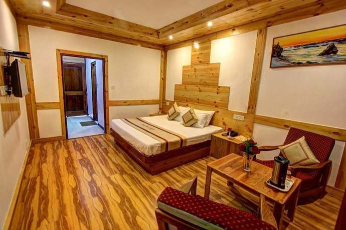 Imagen de la habitación del Hotel The Conifer. Foto 10