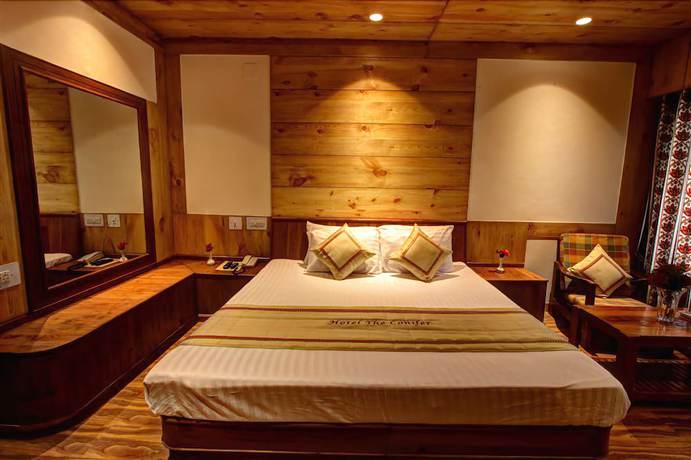 Imagen de la habitación del Hotel The Conifer. Foto 11