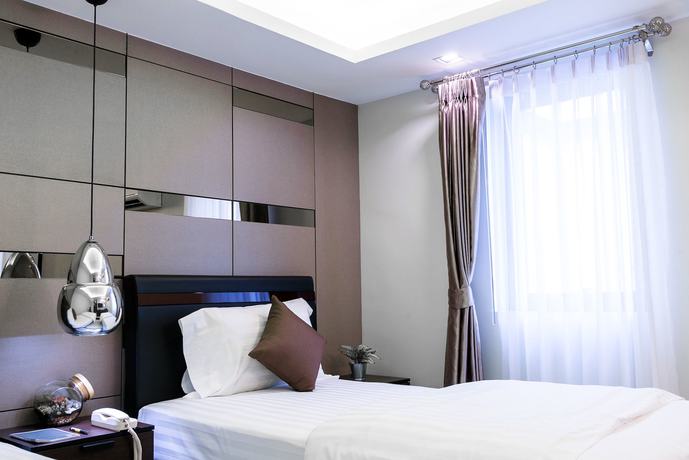 Imagen de la habitación del Hotel The Connex Asoke. Foto 8