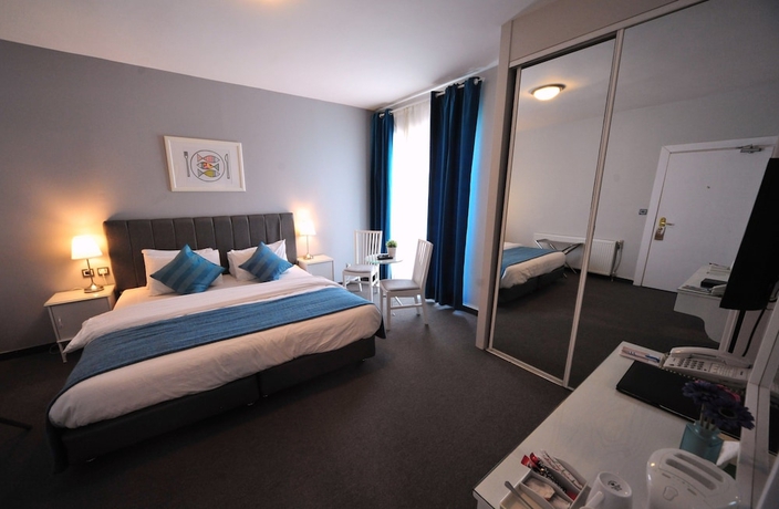 Imagen de la habitación del Hotel The Conroy Boutique. Foto 2