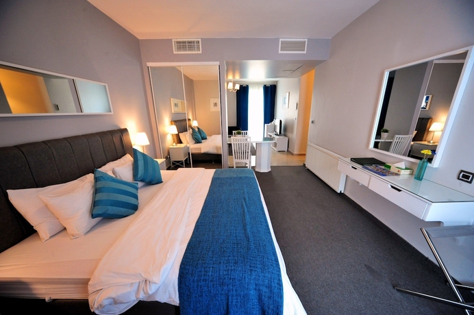 Imagen de la habitación del Hotel The Conroy Boutique. Foto 3