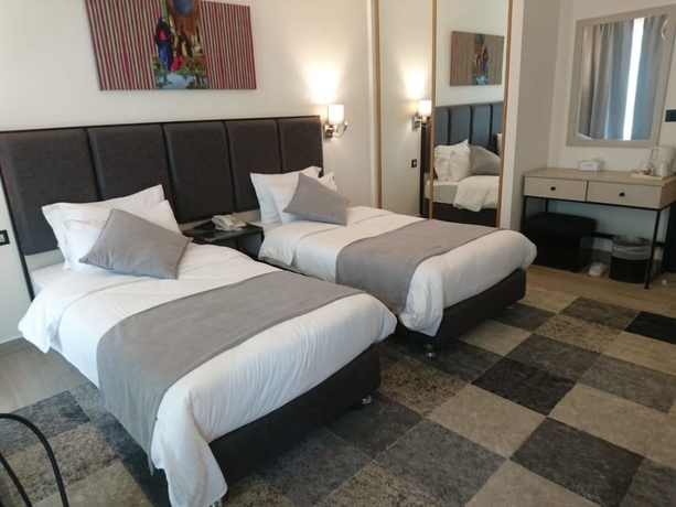 Imagen de la habitación del Hotel The Conroy Boutique. Foto 8