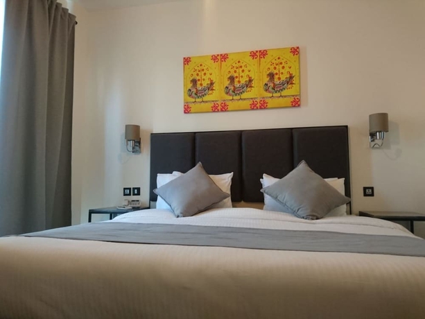 Imagen de la habitación del Hotel The Conroy Boutique. Foto 10