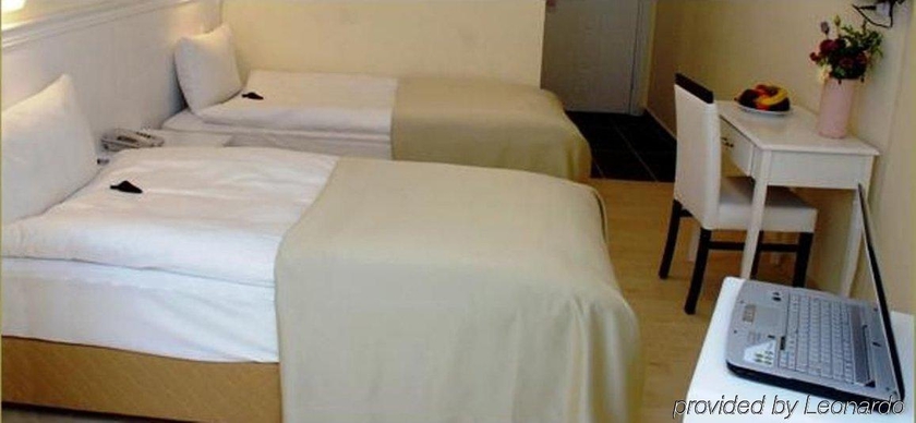 Imagen de la habitación del Hotel The Constantine. Foto 4