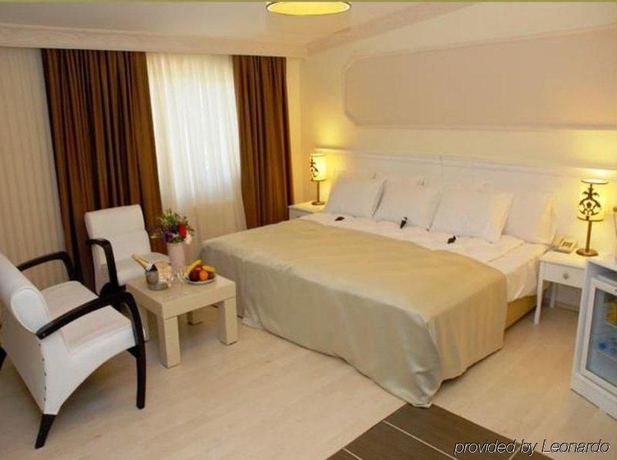 Imagen de la habitación del Hotel The Constantine. Foto 6