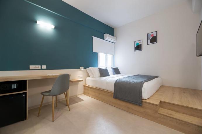 Imagen de la habitación del Hotel The Convo Athens Riviera. Foto 17