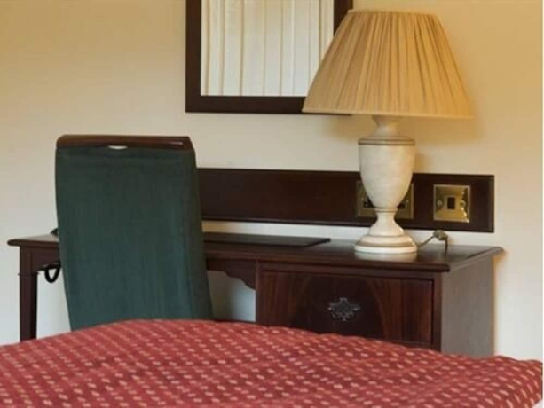 Imagen de la habitación del Hotel The Cook And Barker Inn. Foto 9