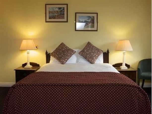 Imagen de la habitación del Hotel The Cook And Barker Inn. Foto 12