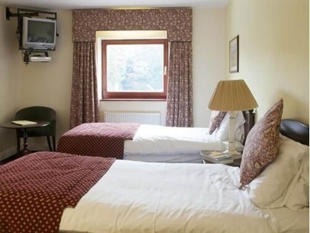 Imagen de la habitación del Hotel The Cook And Barker Inn. Foto 14