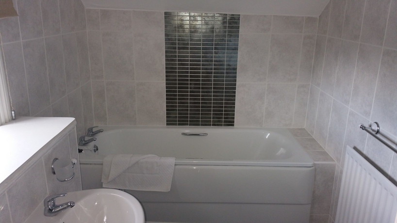 Imagen de la habitación del Hotel The Coquetvale. Foto 5