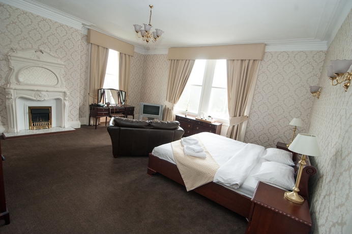 Imagen de la habitación del Hotel The Coquetvale. Foto 13