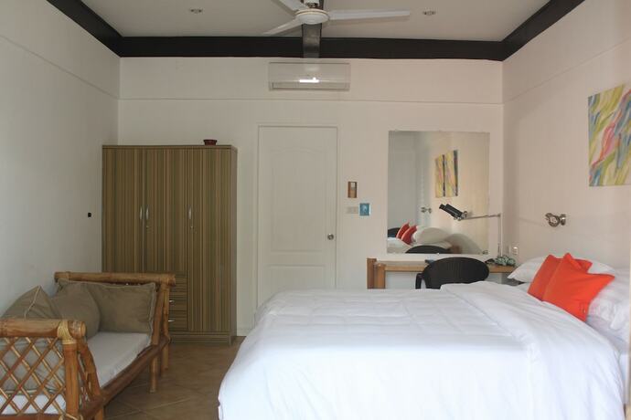 Imagen de la habitación del Hotel The Coral Beach Club. Foto 14