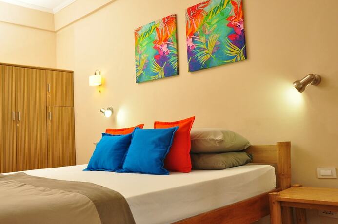 Imagen de la habitación del Hotel The Coral Beach Club. Foto 19