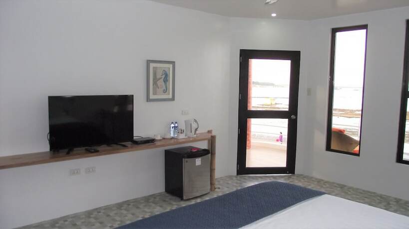 Imagen de la habitación del Hotel The Coral Beach Club. Foto 20