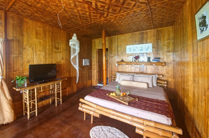 Imagen de la habitación del Hotel The Coral Blue Oriental Beach Villas and Suites. Foto 3